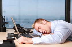 Overworked - asleep at the desk